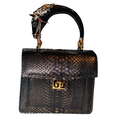 Noir d’Or Horse Handle Handbag
Authentic Black and Gold Python